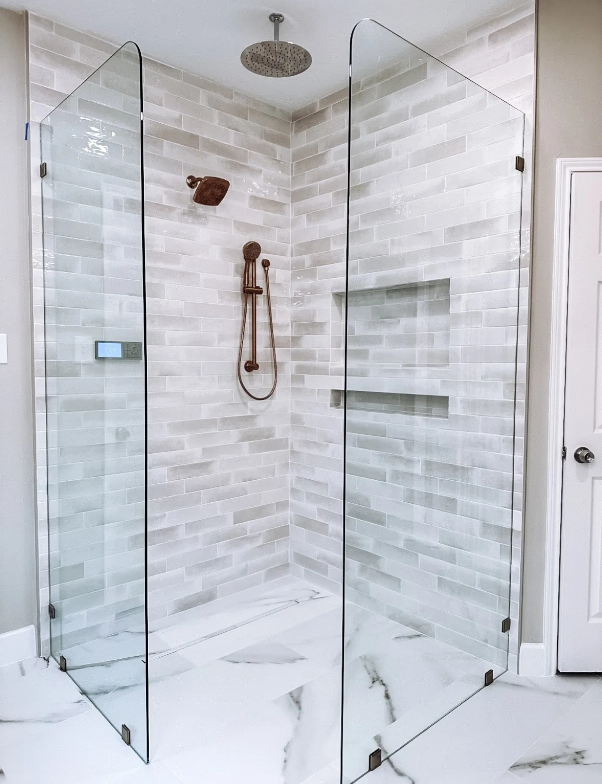 Fully remodeled bathroom with modern vanity and fixtures in Manvel, TX by Texan Home Additions
