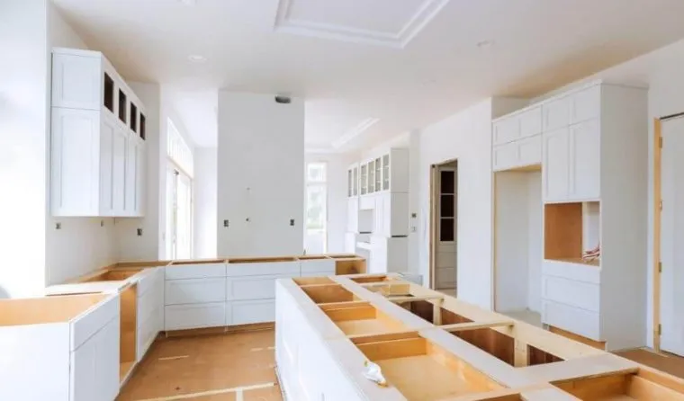 Kitchen remodel in progress without countertops